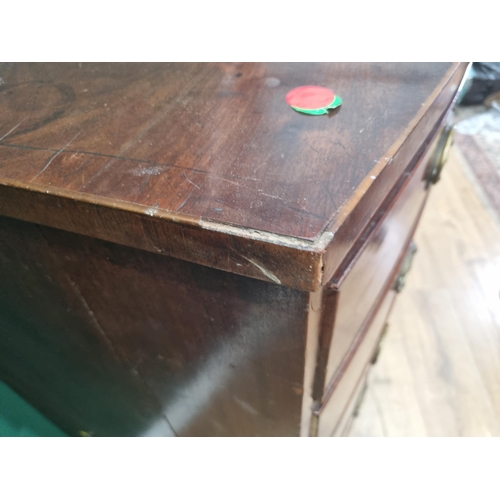 455 - A 19th Century mahogany bow fronted Chest of two short and three long drawers A/F (one rear broken) ... 