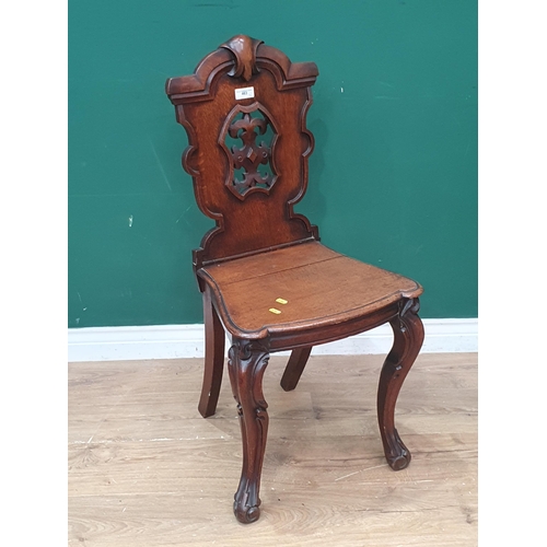 463 - A Victorian oak Hall Chair with pierced back, an oak rush seated Chair and a pair of stick back Chai... 