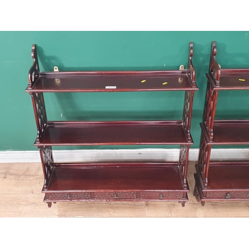 471 - A pair of reproduction mahogany Chippendale style Wall Shelves each fitted three drawers with blind ... 