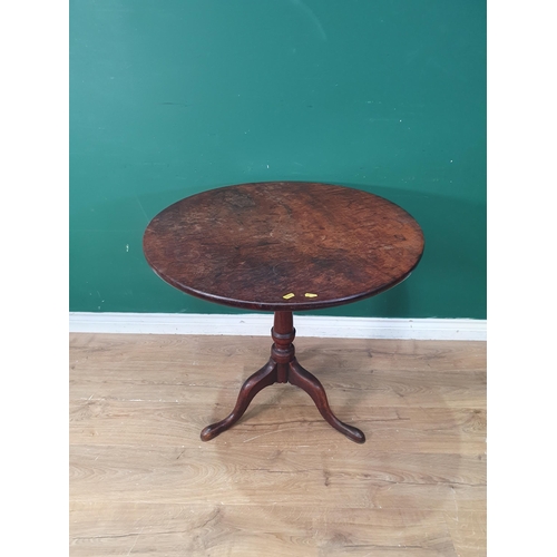 476 - A Georgian plum pudding mahogany Pillar Table with circular top on turned column and tripod base 2ft... 