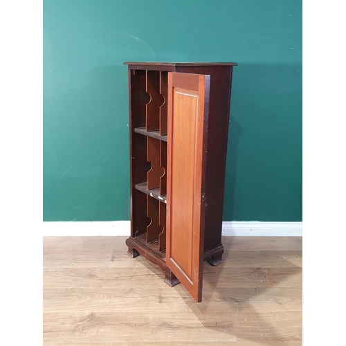 479 - An Edwardian oak Cupboard with single panel door enclosing pigeon holes raised on bracket feet 3ft 8... 