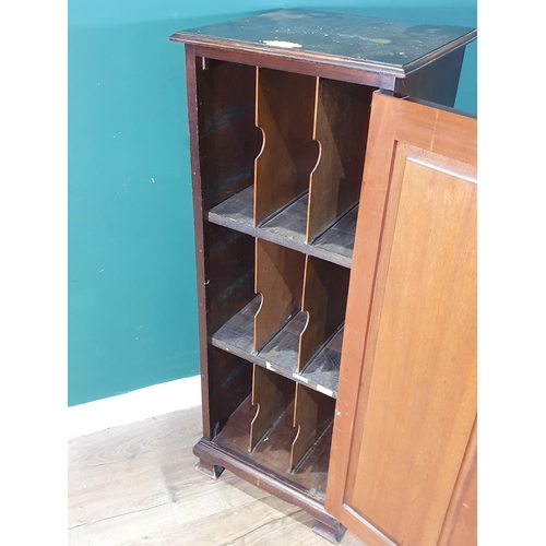 479 - An Edwardian oak Cupboard with single panel door enclosing pigeon holes raised on bracket feet 3ft 8... 