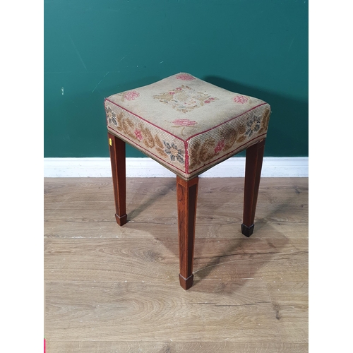 483 - A 19th Century Stool with floral tapestry seat raised on square rosewood and satinwood strung suppor... 