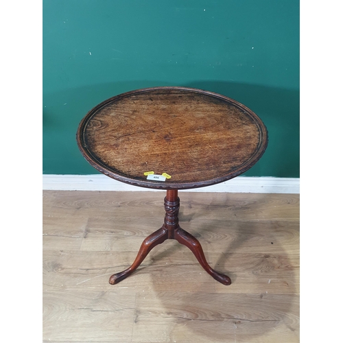 486 - A Georgian mahogany Pillar Table with dished top raised on turned column and tripod base 2ft 4in D x... 