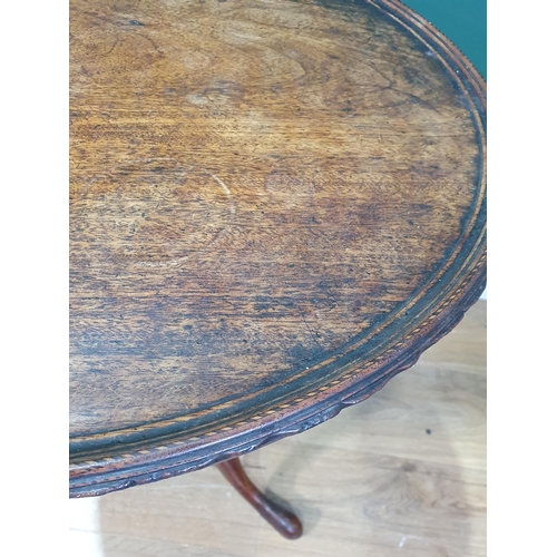 486 - A Georgian mahogany Pillar Table with dished top raised on turned column and tripod base 2ft 4in D x... 