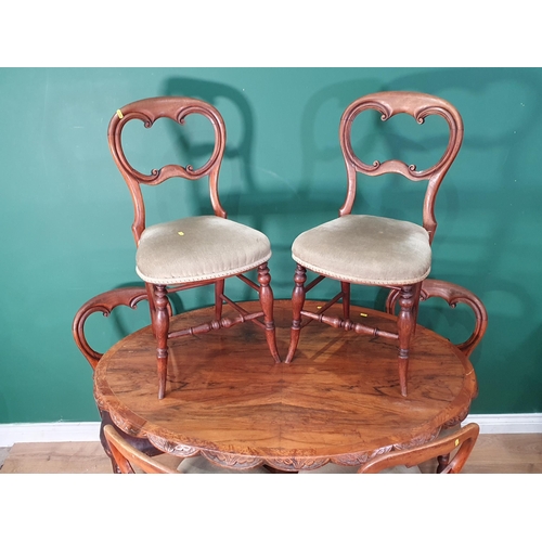 491 - A Victorian walnut oval Loo Table on quadruple splayed base 4ft W x 2ft 4in H and a set of six Victo... 