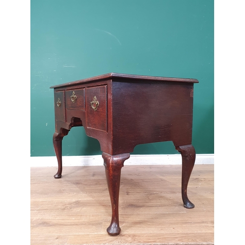 495 - An 18th Century oak Lowboy with moulded top above three drawers raised on cabriole supports 3ft 5in ... 