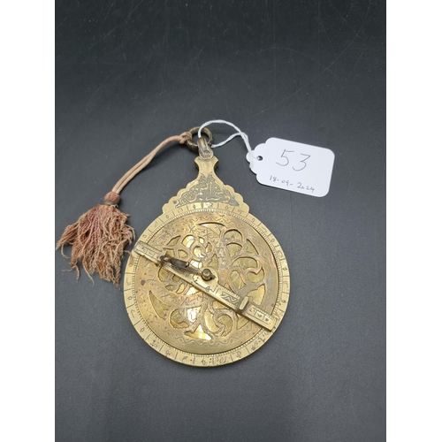 53 - An Islamic/Persian brass Astrolabe with engraved detail and suspension loop (R1)