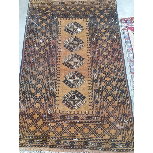 533 - A Persian woollen brown ground Rug with five stylised flowers within multiple borders 5ft 2in L x 3f... 