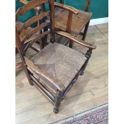 546 - Three antique Ladderback Chairs (two Carvers and a Single), and a solid seated Splat back Elbow Chai... 