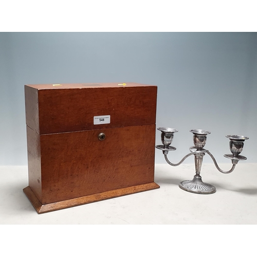 548 - An oak Decanter Box by Albert Baker Ltd, containing three decanters with plated labels,  14in W and ... 