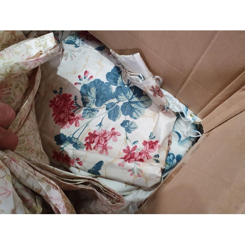 555 - Two Boxes of assorted Textiles including, Cushions, Linen, Curtains, etc. (R6).