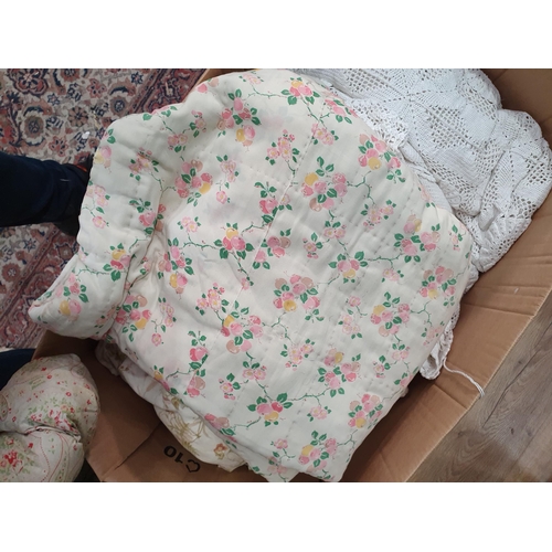 559 - A Box of assorted Quilts, a pair of Curtains, Table Linen, etc. (R6).