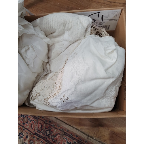 560 - A Box of assorted white Table Linen, and a small wicker Basket. (R6).