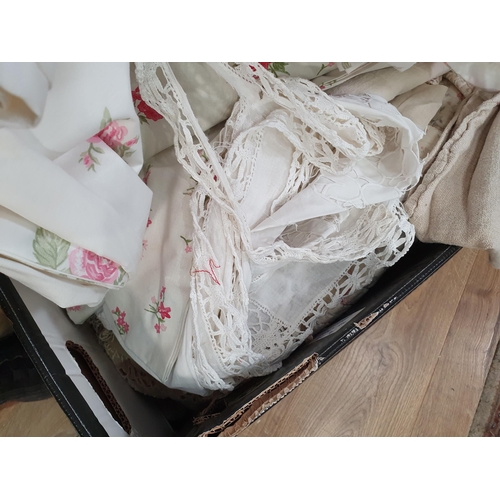 562 - A large quantity of assorted Textiles including Table Linen, Blankets, Vintage Clothing, etc. (R6).