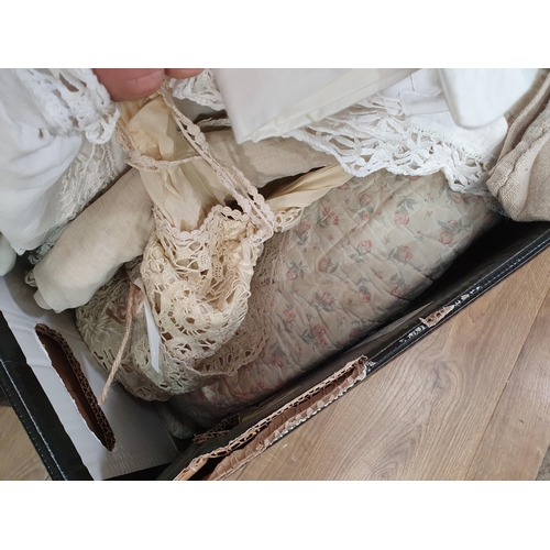 562 - A large quantity of assorted Textiles including Table Linen, Blankets, Vintage Clothing, etc. (R6).