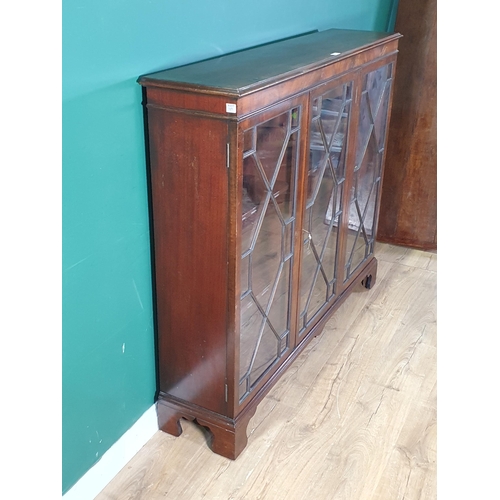 567 - A mahogany astragal glazed three door Bookcase/Display Cabinet on bracket supports, 4ft 1