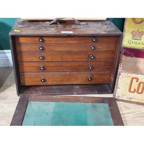 568 - Two wooden Boxes with fall-fronts enclosing drawers, 18in W, a Woolland Bros, Knightbridge, London c... 