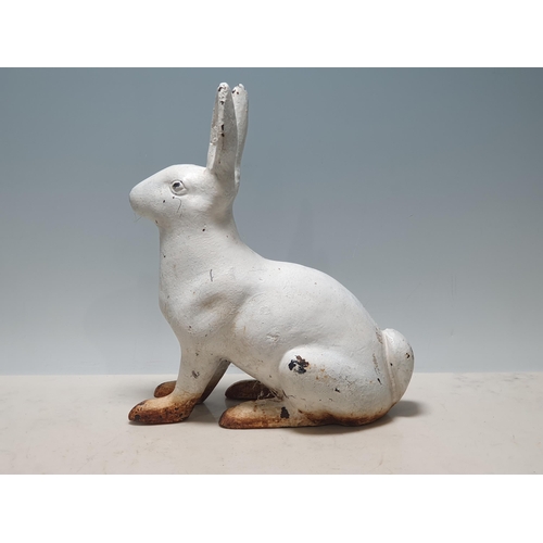 571 - A white painted cast metal Figure of a Hare, 11