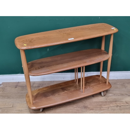 6 - An Ercol blonde elm three tier small Giraffe on casters  3ft  W x 2ft 4in H (R2)