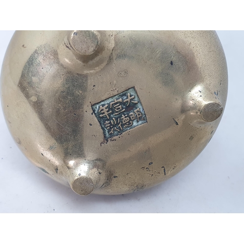 60 - A Chinese brass Censor with pierced handles and six character mark under, 3 1/2in diam (R1)