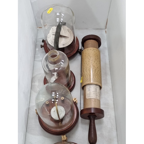 639 - A Weights and Measures Calculator, and four scientific related items, three under glass domes, (R4)