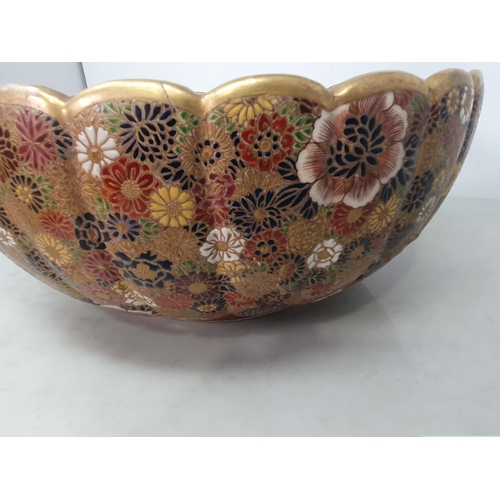 65 - A Satsuma Bowl with all over chrysanthemum pattern, wavy gilt rim, 12in diam, gilt character marks u... 