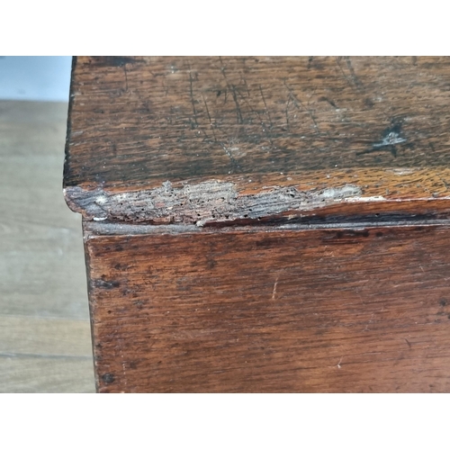 662 - An antique oak Box the hinged lid enclosing candle box 2ft 3in W x 10 1/2in H (R7)