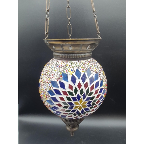 70 - Two Moorish style Hanging Lampshades with glass mosaic design on a white ground, with metal mounts a... 