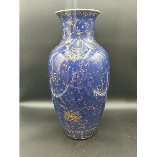 75 - A large Chinese baluster Vase with gilt floral decoration on a blue ground, 19in, old paper labels u... 