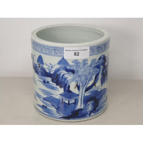 82 - A Chinese blue and white Brush Pot painted landscape, 6in, A/F, and a wooden Brush Pot, 5 1/2in (R1)