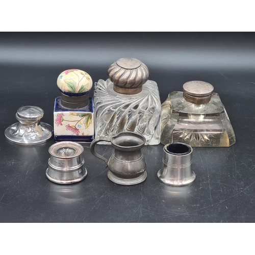 87 - Two silver lidded glass Inkwells, small Capstan Inkwell, ceramic Inkwell, etc mostly A/F