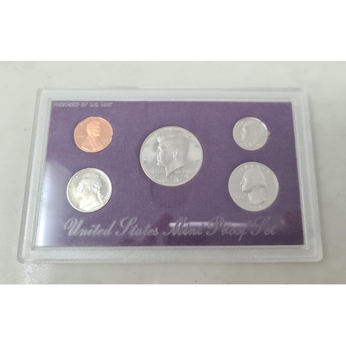 99 - A Set of six Australian Proof Coins, 1980, and two United States five coin Proof Sets, 1992