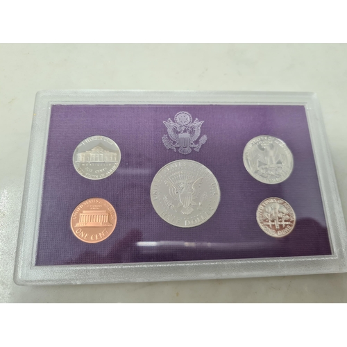 99 - A Set of six Australian Proof Coins, 1980, and two United States five coin Proof Sets, 1992