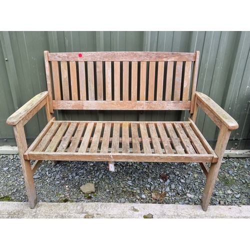 904 - A weathered two seater slatted Garden Bench, 47