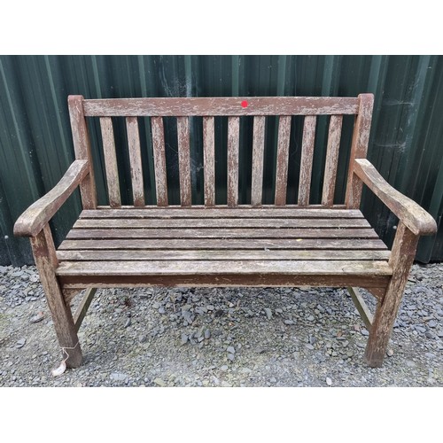 905 - A Weathered two seater slatted Garden Bench, 47