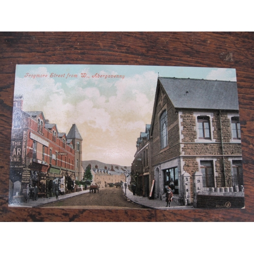 402 - An Album containing Edwardian and later postcards, many with topographical interest :including  Here... 