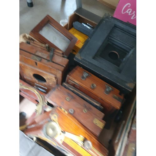 289 - Four boxes containing mahogany and brass large format plate Cameras and others, Tripods, etc, (R4)