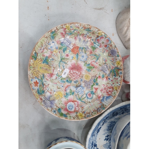 294 - A Chinese floral decorated Dish, 9in diam, A/F, two Staffordshire seated Spaniels, a pair of Staffor... 