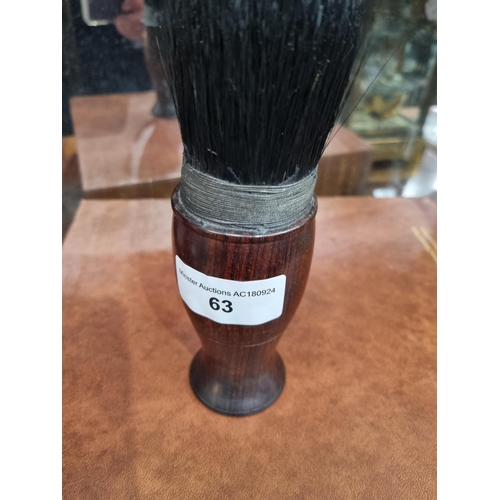 63 - A Chinese Brush with baluster turned hardwood handle having screw base enclosing compartment, 7in (R... 