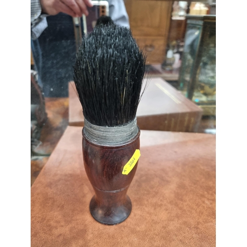 63 - A Chinese Brush with baluster turned hardwood handle having screw base enclosing compartment, 7in (R... 