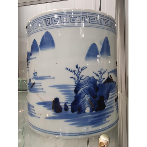 82 - A Chinese blue and white Brush Pot painted landscape, 6in, A/F, and a wooden Brush Pot, 5 1/2in (R1)