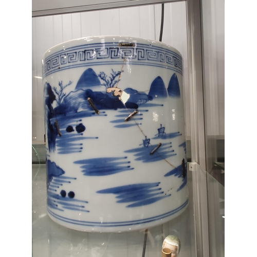 82 - A Chinese blue and white Brush Pot painted landscape, 6in, A/F, and a wooden Brush Pot, 5 1/2in (R1)