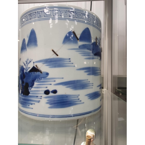 82 - A Chinese blue and white Brush Pot painted landscape, 6in, A/F, and a wooden Brush Pot, 5 1/2in (R1)