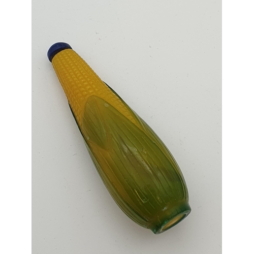 219 - A glass Snuff Bottle formed as corn on the cob, a pale blue glass Snuff Bottle and two others