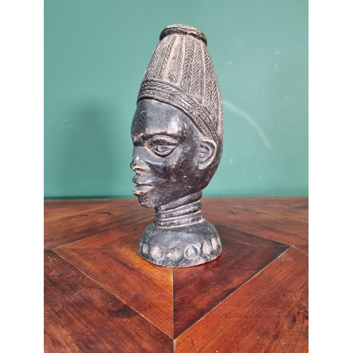 442 - An East African carved Head of a male tribesman with plaited hair 10 3/4in H (R2)