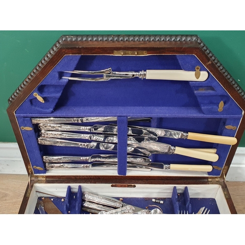 463 - An oak cased Canteen of plated King's Pattern Cutlery and other plated Serving Spoons and Carving Kn... 