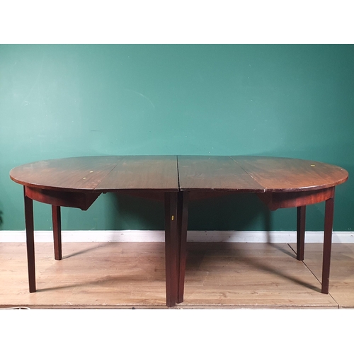 65 - A 19th Century mahogany D-End Dining Table with two leaves, with shaped frieze, and raised on square... 