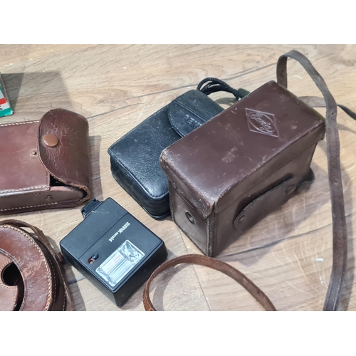 13 - A box of assorted Cameras and a Compass (R10)