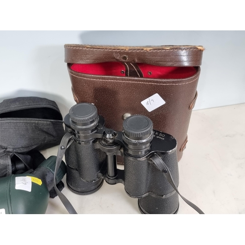 144 - An Adventuridge Spotting Scope and Tripod and a pair of Regent 10x50 Binoculars (R7)